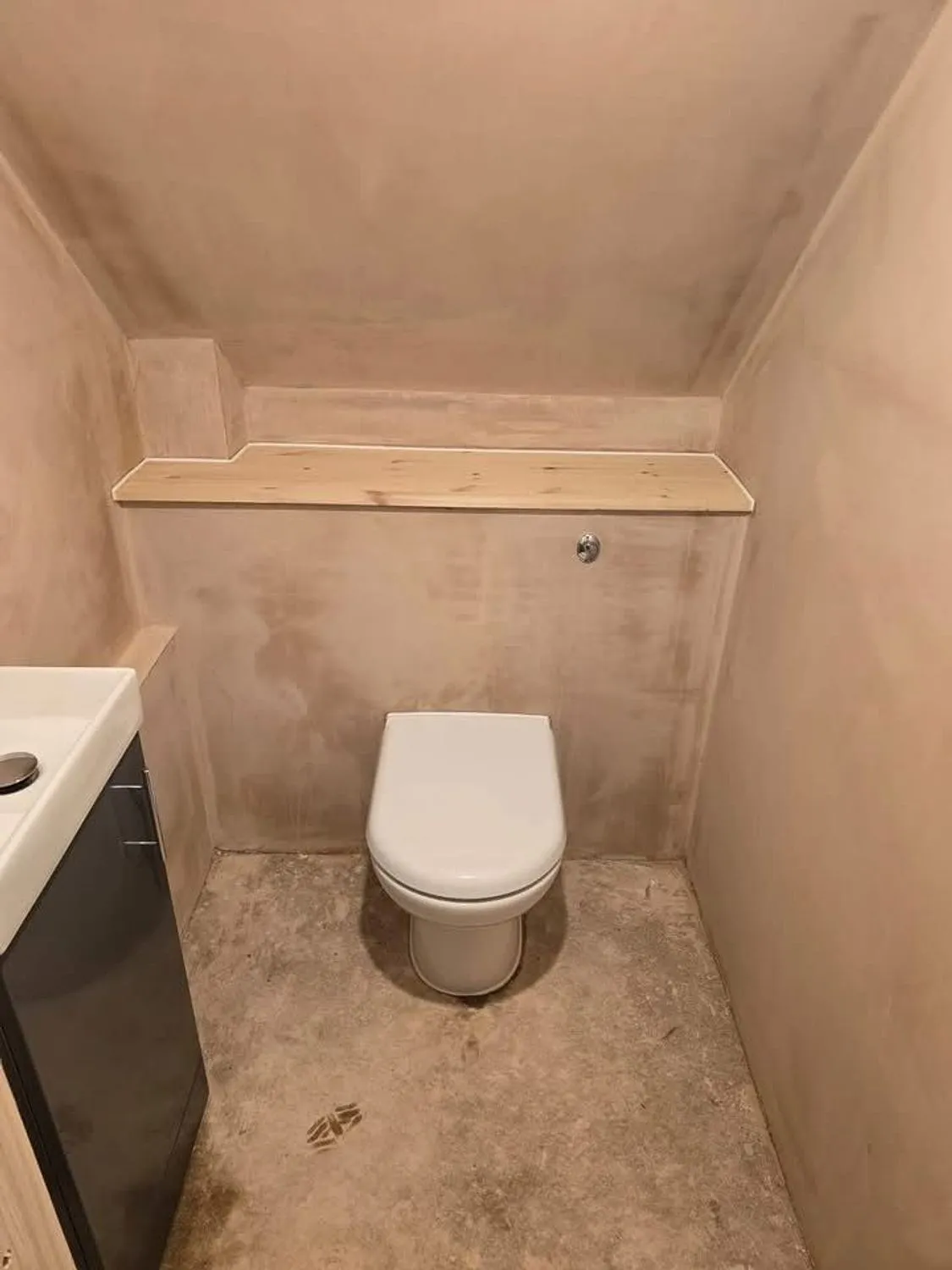 New downstairs cloakroom with concealed cistern and wall hung basin