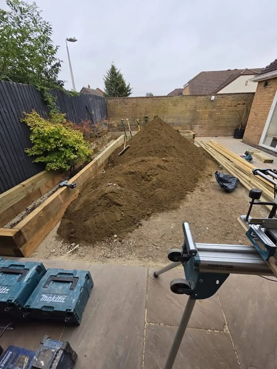 Rear garden excavated with sleeper retaining beds going in