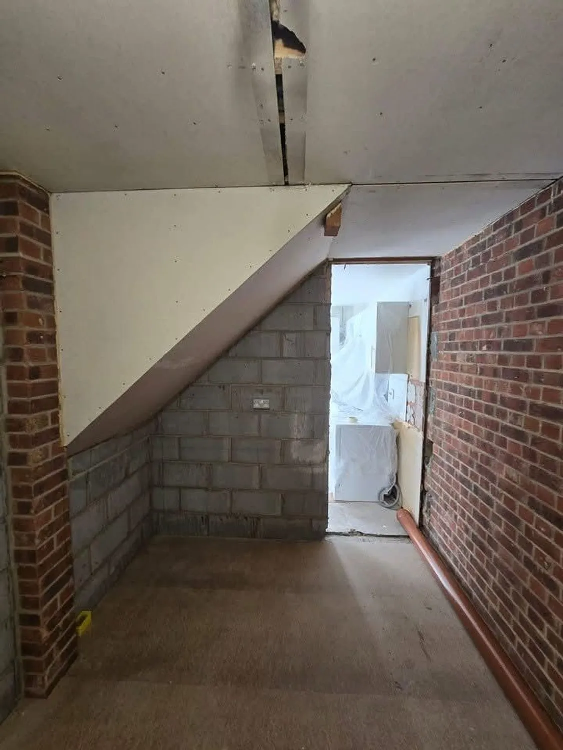 New opening formed in the under stairs wall
